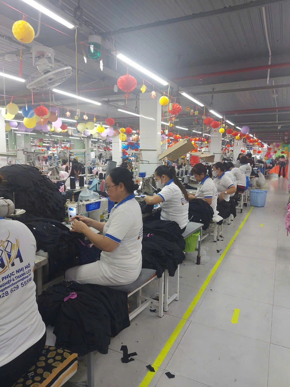 Quy trình sản xuất đồng phục văn phòng tại xưởng Nhị Hồ